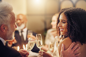 Image showing Success, toast or happy people in a party in celebration of goals, achievement or new year at luxury event. Black woman, old man or friends cheers with champagne drinks or wine glasses at dinner gala
