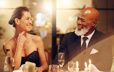 Image showing Happy, funny black man or woman in a party celebration of goals or new year at luxury social event. Friends, congratulations or senior people laughing, bonding or talking at dinner gala on holiday