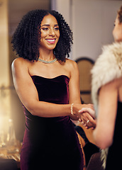 Image showing Success, handshake or black woman in a party shaking hands in a partnership agreement at an event. Thank you, congratulations or happy lady greeting or social meeting at luxury dinner gala for a deal