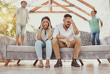 Image showing Tired parents, running children and family in a room feeling anxiety, headache and stress. Kids chaos, sofa jump and fatigue of mom and father together on a couch frustrated and burnout from noise