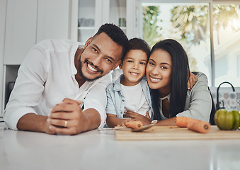 Image showing Kitchen, portrait and parents with their boy child to cook dinner, supper or lunch together. Love, smile and happy family from Brazil preparing healthy food or meal with vegetables in their house.