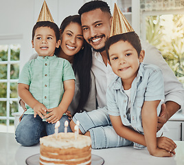 Image showing Birthday, portrait and children with parents in a kitchen for cake, celebration and family bonding. Party, cake and kids with mother and father, happy and smile while celebrating, brothers and joy