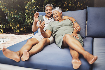 Image showing Senior couple, relax and smile for video call, social media or selfie together on outdoor patio at home. Happy elderly man and woman relaxing on comfortable cushion for online chat or communication