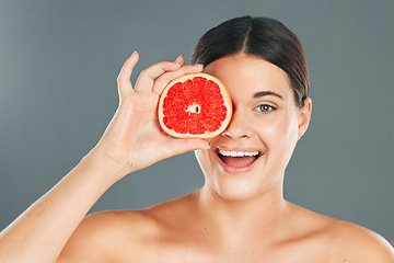 Image showing Grapefruit, skincare, woman or aesthetic wellness for healthy diet, happy results or clean glowing on grey background. Beauty portrait, smile or girl model face, facial makeup or cosmetics for health