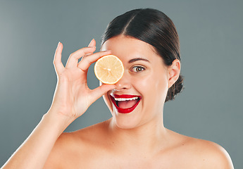 Image showing Orange, skincare, woman or aesthetic wellness for healthy diet, happy results or clean glowing on grey background. Beauty portrait, smile or girl model face, facial makeup or cosmetics for health