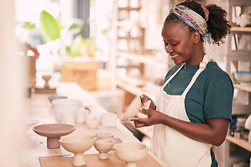 Image showing Ceramic store, creative pottery and black woman working on sculpture design mold, manufacturing or art product. Creativity, molding and startup small business owner, worker or girl in studio workshop