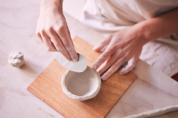 Image showing Pottery tools, bowl and hands of woman design sculpture mold, creative manufacturing or art product. Ceramic store, startup small business owner or artist working on clay handcraft in studio workshop