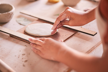 Image showing Ceramics, pottery and design with hands of woman in workshop studio for mold, creative and art. Clay, sculpture and manufacturing with girl artisan on table for crafting, handmade and hobby