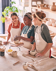 Image showing Pottery class, workshop and artist teaching sculpture design, clay manufacturing or art product. Creative mold, ceramic retail store and startup small business owner, woman or team working in studio