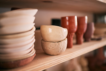 Image showing Pottery background, ceramics and bowl on studio shelf, creative store and manufacturing startup. Closeup of clay market, collection and display in workshop, small business and products in craft shop