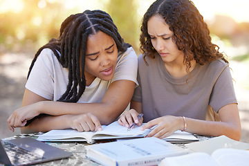 Image showing Students, confused and reading book, help and studying at park. University, education teamwork and doubt or uncertain women or friends learning, research or helping with textbook assignment outdoors