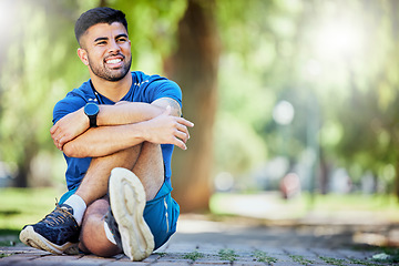 Image showing Exercise, fitness and a man outdoor at park with space for mock up cardio workout or training goals. Happy sports person or athlete in nature thinking about a run and energy for health and wellness