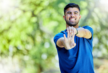 Image showing Fitness, mockup and warm up with a sports man outdoor in nature, stretching before exercise. Workout, mock up and training with a male athlete on a natural green background for health or cardio