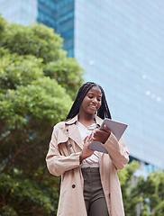 Image showing Tablet, business street and black woman in city, internet browsing or research. Tech, employee and low angle of happy female with touchscreen for reading email, networking or social media outdoors.