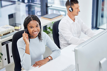 Image showing Customer service, call center and happy woman at desk while consulting online for CRM, contact us or sales. Support team people at office help desk for telemarketing and communication with a smile