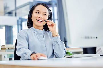 Image showing Call center, customer service and woman at computer while consulting online for CRM, contact us or sales website. Asian person at help desk for telemarketing, support and communication with a smile