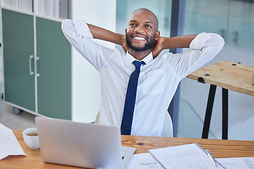 Image showing Business laptop, black man and relax in office after finishing project or complete task. Break, thinking or male worker resting after hard work, writing email or planning finance strategy in company