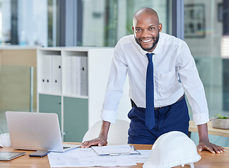 Image showing Portrait, black man and architect in office, laptop and achievement with startup, manager or smile. Nigerian male employee, confident leader or engineer with blueprints, happiness or business success