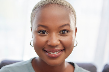 Image showing Smile, happy and portrait of a black woman in a house to relax, rest and calm. Beautiful, attractive and face of a cheerful African girl smiling, relaxing and elegant in the living room of home