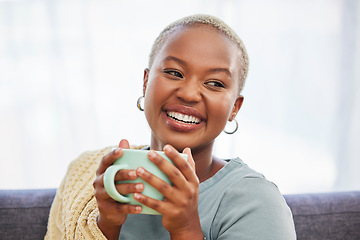 Image showing Black woman, relax and sofa with drink, coffee and smile in home living room for me time. Young African lady, peace or tea on couch for happiness, self care and chilling in house, apartment or room