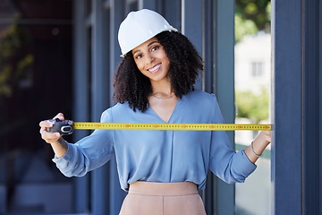 Image showing Construction worker, happy in portrait with black woman and tape measure, architecture and building industry. Measurement, architect and engineering contractor in safety helmet and tools in portrait