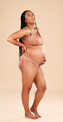 Image showing Pregnancy profile, underwear and studio woman with smile, happy and excited for baby, stomach growth or motherhood. Gynecology maternity care and pregnant African model with healthcare, love and hope