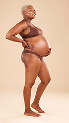 Image showing Happy pregnancy, underwear and studio woman with happiness, smile and excited for baby, stomach growth or motherhood. Gynecology, maternity and pregnant African model with healthcare, love and hope