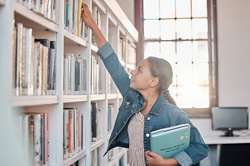 Image showing Books, education or girl in a library to search for knowledge or development for future learning. Scholarship, child growth or happy student studying, information or searching for a story at school