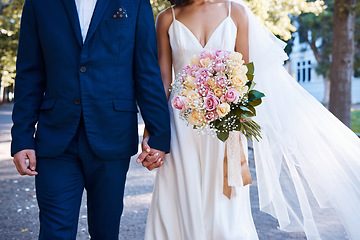 Image showing Bouquet, wedding and love of bride, groom and outdoor photograph at celebration, event or reception. Roses, flowers and marriage of bridal couple, romance and park in commitment, union or partnership