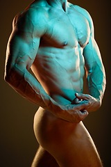 Image showing Muscle, flexing and body of a nude man with erotic creativity isolated on black background in studio. Creative, strong and arms of sexy naked model in fluorescent lighting for sensuality on backdrop