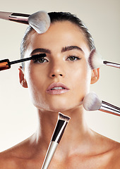 Image showing Makeup brush, beauty and face of a woman in studio for cosmetic product advertising. Aesthetic model person with skin tools for facial skincare and dermatology with glow using mascara and foundation