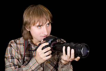 Image showing Photographer with the camera with a telefocus lens
