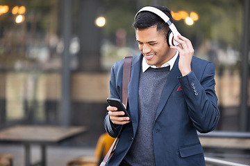 Image showing Headphones, black man and 5g phone listening with music streaming ready for work. Social media, mobile 5g connection and professional with web business podcast on technology and internet with mockup