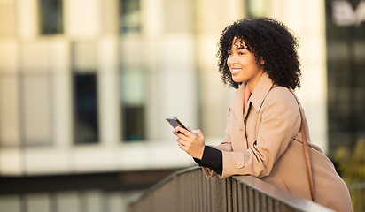 Image showing Search, travel or black woman with phone for internet research, communication or networking. Happy, smile or professional in London street on 5g smartphone for social network, web or blog review
