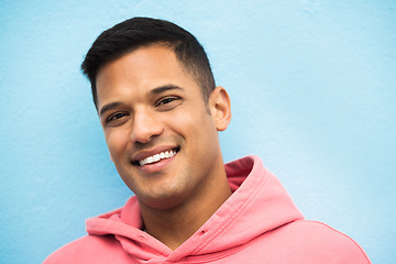 Image showing Fashion, smile and portrait of man on blue background with positive mindset, confidence and happiness. Mockup, freedom and isolated face of male with happy attitude or relax model in Brazil