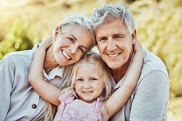 Image showing Grandparents, girl and smile portrait in a family outdoor park happy about a picnic. Children, happiness and kids with elderly grandparent in garden or backyard smiling and bonding together in nature