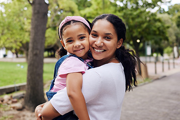 Image showing Portrait, mom and child hug in park, fun day outdoor with love and care, happy people together in nature. Family, happiness and bonding with childhood, woman with girl on adventure with smile