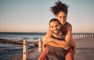 Image showing Fitness, beach and portrait of couple piggyback enjoy holiday, vacation and quality time on weekend. Love, summer and black man and woman relax after running, exercise workout and training by ocean