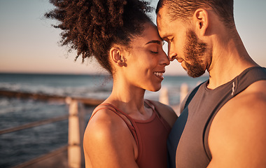 Image showing Black couple, smile and hug with forehead by beach embracing relationship, compassion or love and care. Happy man and woman touching heads smiling in happiness for support, trust or romance in nature