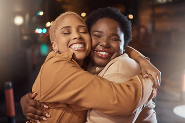 Image showing Women, bonding or hug in city night, party event or late social for birthday celebration, New Year or road festival. Smile, happy or friends embrace, support or trust on dark urban street in fashion