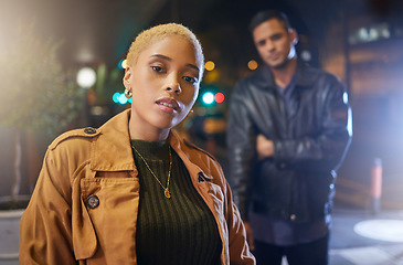 Image showing Woman, man and portrait in city, night and street with fashion, nightlife and urban adventure in dark. Gen z couple, outdoor and road in metro with sexy, punk or rock aesthetic by blurred background