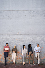 Image showing Diversity, business people talking and standing outdoor with technology for wall mockup, happy conversation and interview meeting. Team, online communication and speaking together for hr recruitment