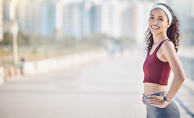 Image showing Happy woman, portrait and fitness with arms akimbo in city for exercise, wellness and mockup in Miami. Female athlete, smile and standing ready for urban workout, summer training and sports marathon