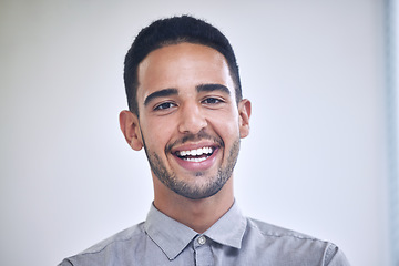 Image showing Businessman, portrait and face of a worker in a office ready for working. Happy, smile and work employee from London in creative tech designer company feeling calm in workplace with job happiness