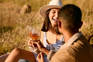 Image showing Couple with wine, outdoor picnic and happiness, romantic date with alcohol and commitment with adventure. Travel, man and woman with happy people, love and care with cheers, holiday and romance