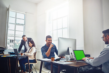 Image showing Portrait, teamwork and business man by computer in office workplace. Laptop, mockup green screen and young male employee working on marketing, advertising or sales project with people or coworkers