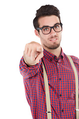 Image showing Portrait, hand and man pointing in studio for you, blame and accountability against white background. Face, guy and finger gesture showing choice, direction, guilt and choosing or standing isolated