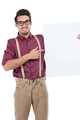 Image showing Portrait, banner and portrait of man in studio with paper, billboard and mockup on white background. Face, placard and young entrepreneur excited about advertising, space and standing isolated