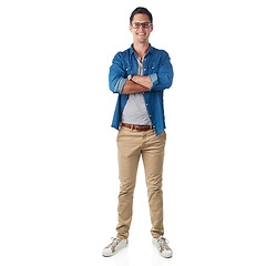 Image showing Portrait, fashion and mockup with a man in studio isolated on a white background standing arms crossed. Trendy, casual and mock up with a handsome young male posing on blank space in stylish clothes