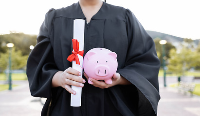 Image showing Piggy bank, saving and university diploma in hands of woman graduate with education scroll. Study paper, scholarship and college trust fund of a woman hand at college event with money for future